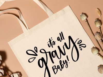 it's all gravy baby free svg file on tote bag flatlay photo