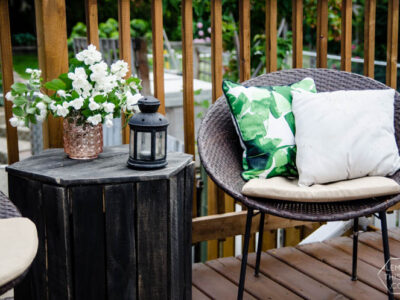 I love the wood look deck and this seating area is so sweet!