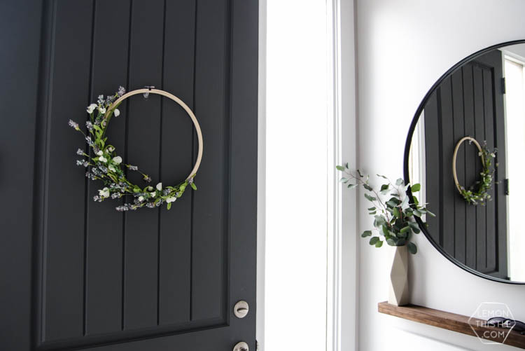 DIY Split Level Entry Makeover- I LOVE this entry. The oversize door, scandi influence and that shoe storage!