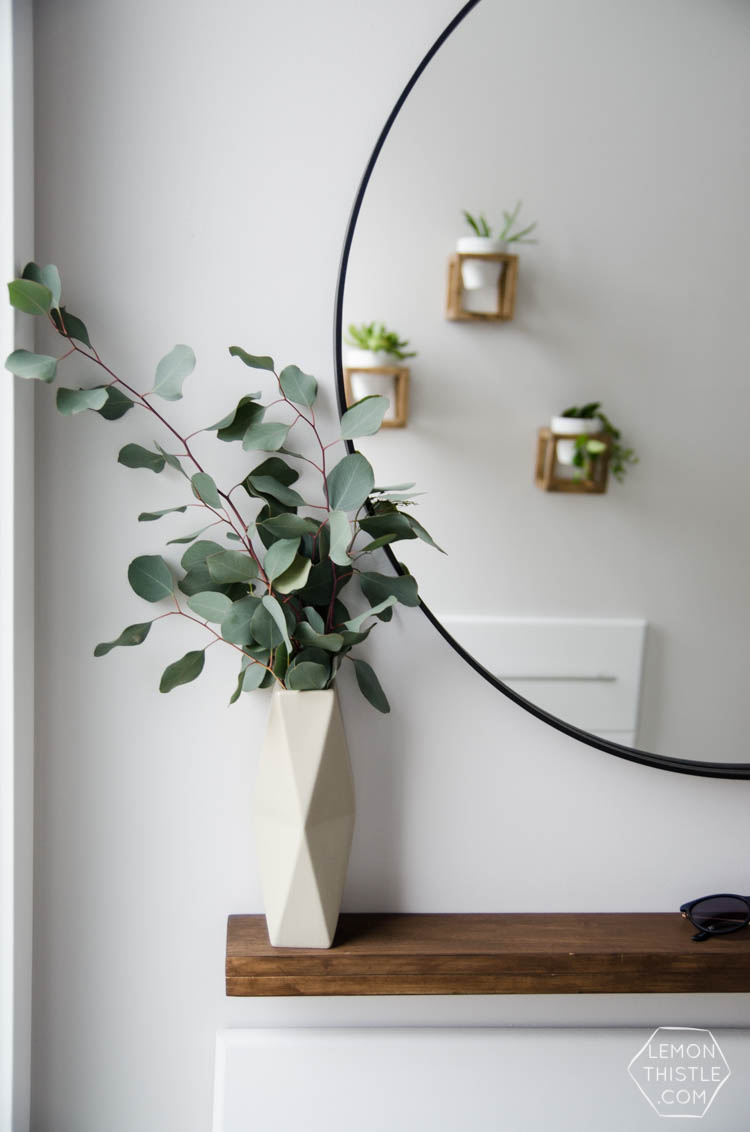DIY Split Level Entry Makeover- I LOVE this entry. The oversize door, scandi influence and that shoe storage!