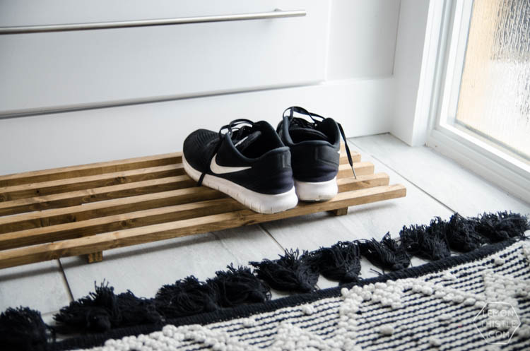 DIY Split Level Entry Makeover- I LOVE this entry. The oversize door, scandi influence and that shoe storage!