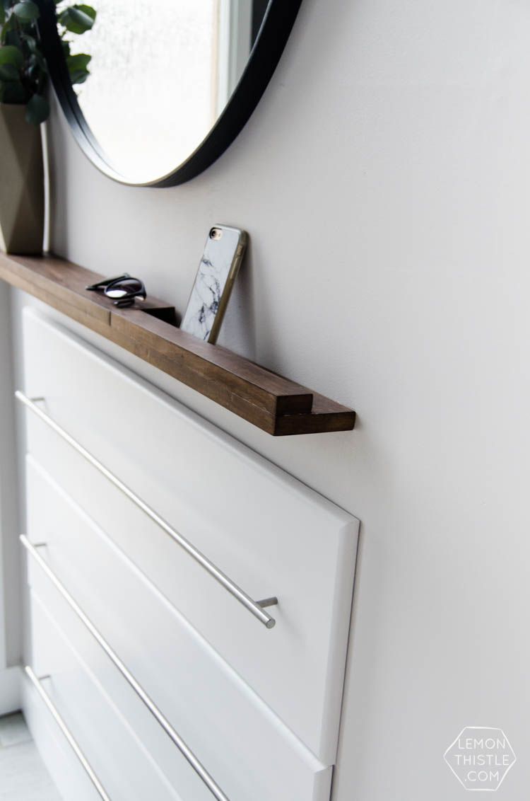 DIY Split Level Entry Makeover- I LOVE this entry. The oversize door, scandi influence and that shoe storage!