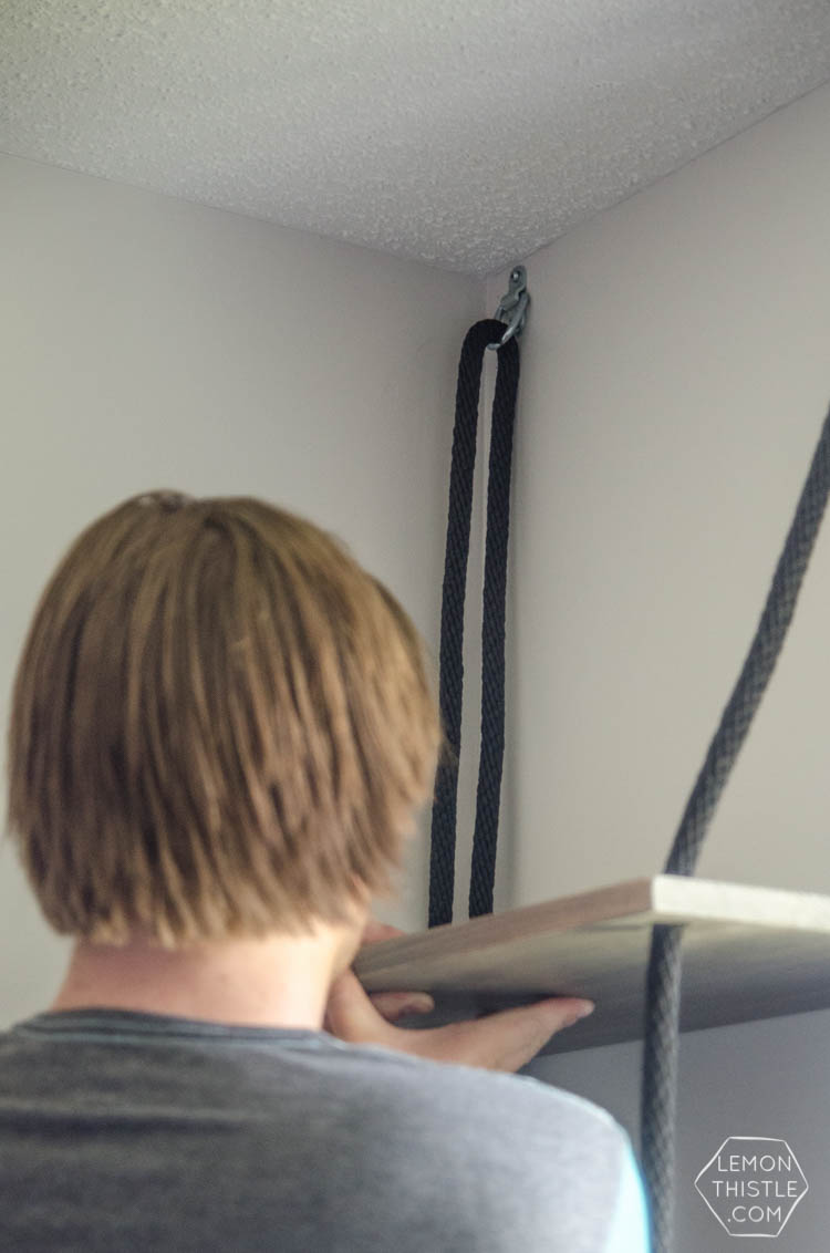 DIY Hanging Rope Shelving- such a fun alternative to a bookshelf!