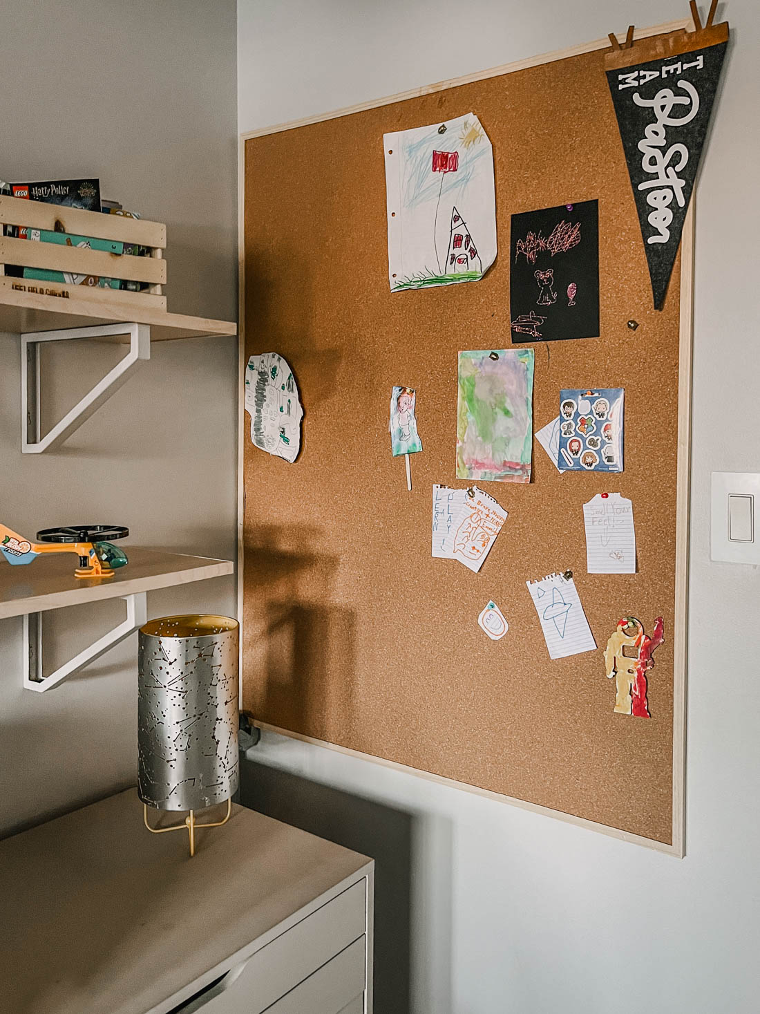 Kids artwork display in playroom