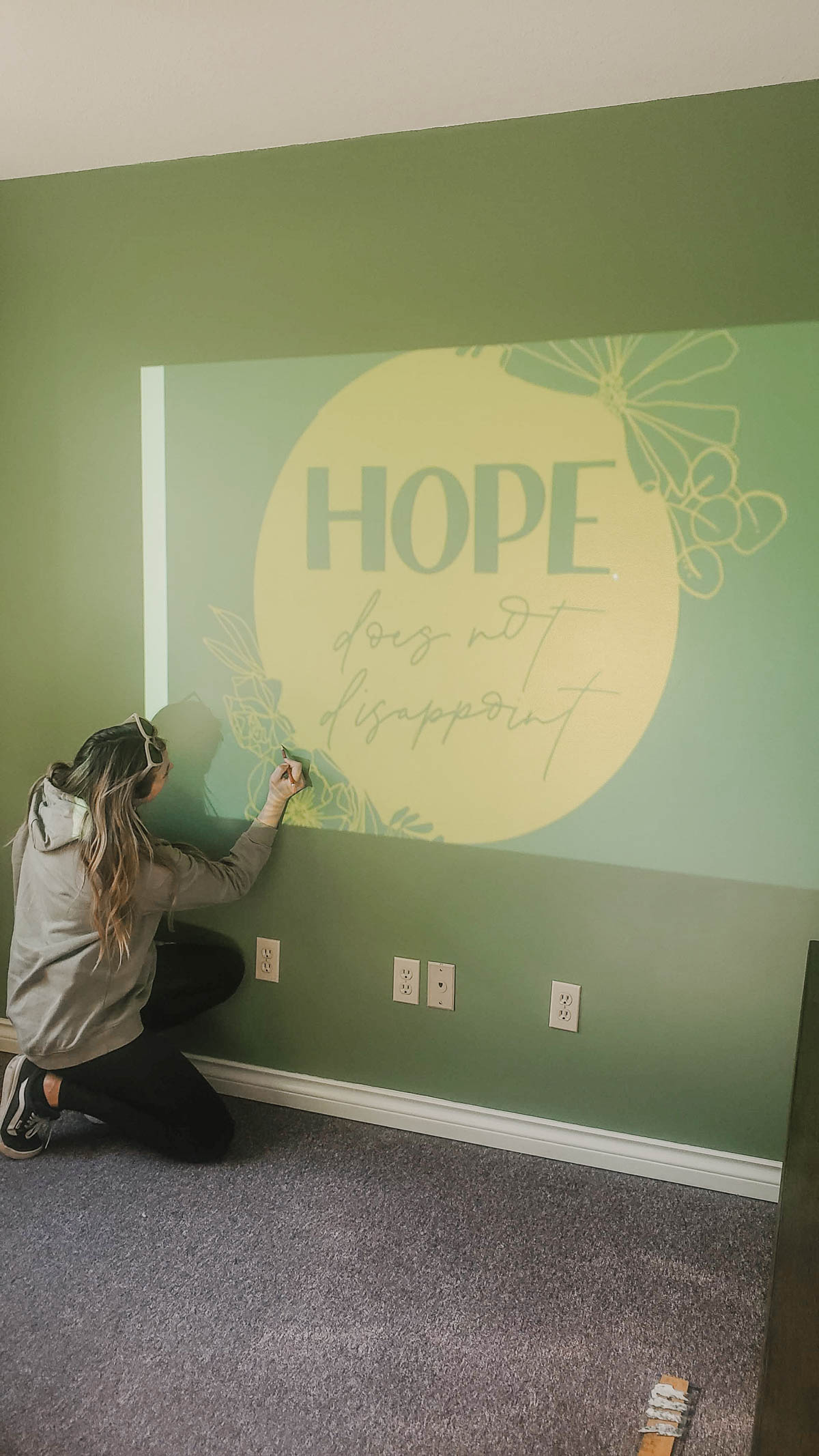 projecting a design onto the wall in sections for a mural