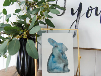 Watercolour rabbit with vase of seeded eucalyptus for spring mantel decor
