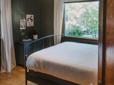 Dark Green Bedroom with wood trim