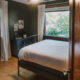 Dark Green Bedroom with wood trim