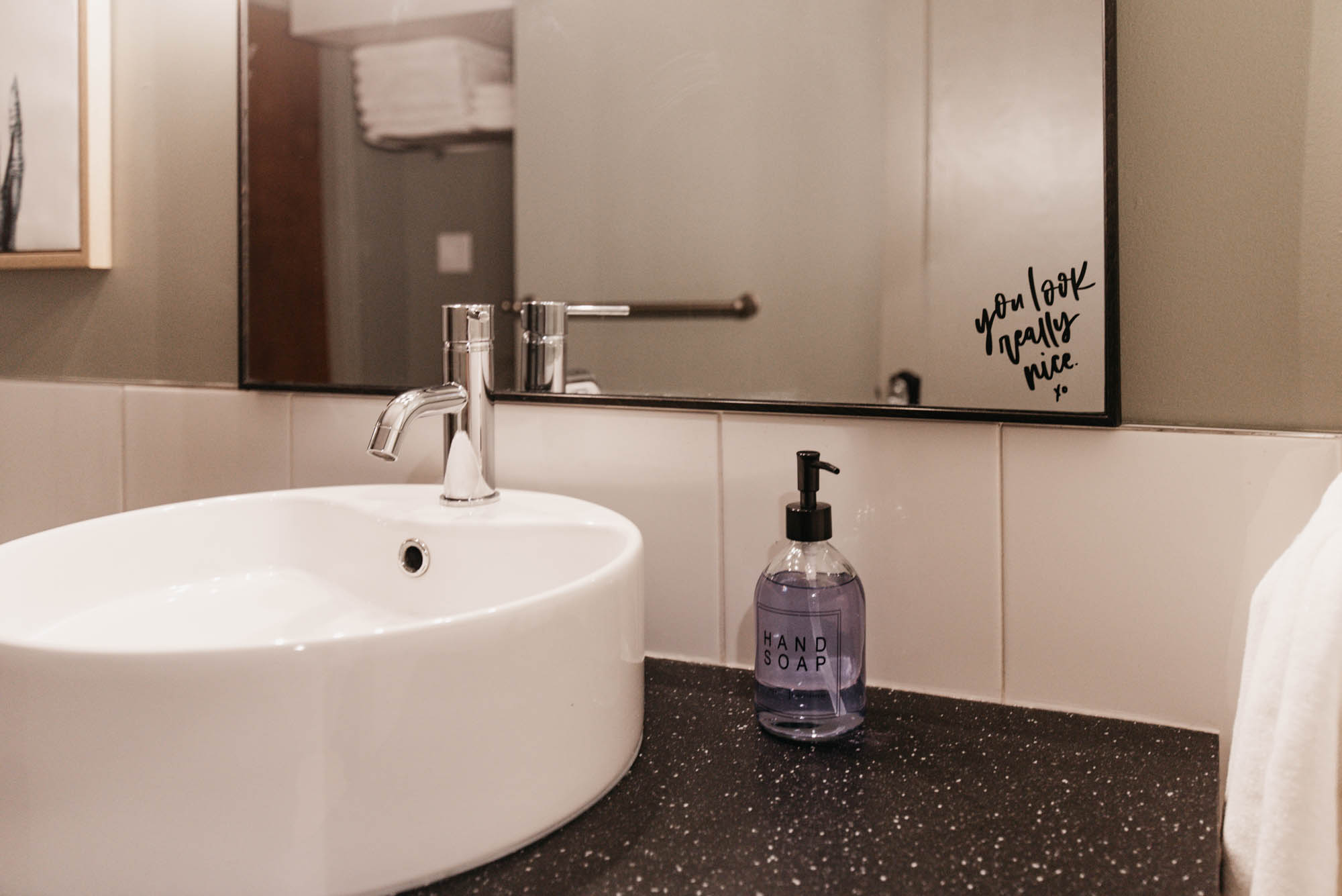 You look really nice mirror decal in airbnb bathroom