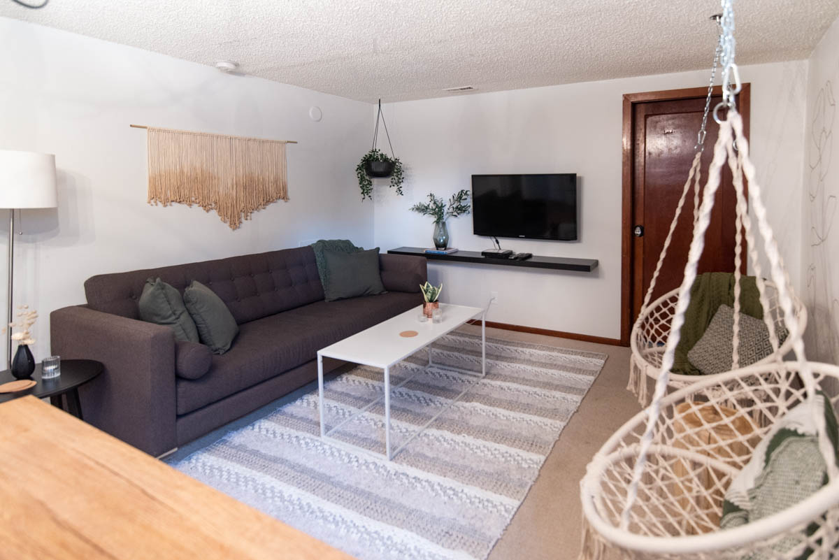cozy basement suite update with hanging plant and macrame