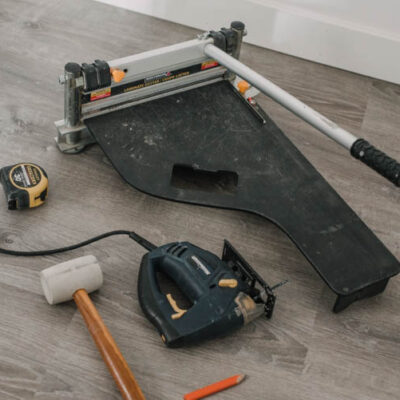 Tools for laying vinyl plank flooring quickly