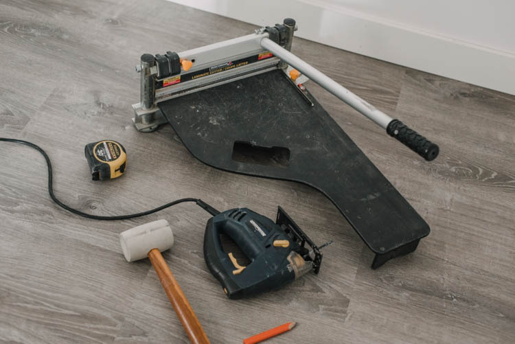 Tools for laying vinyl plank flooring quickly