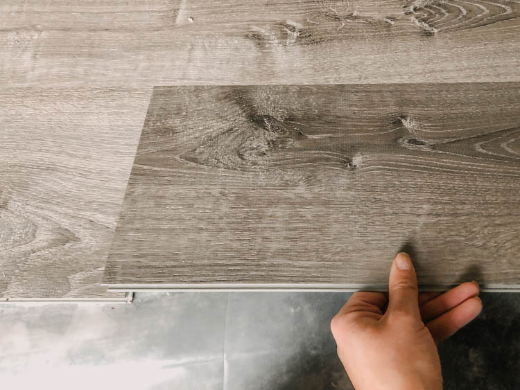 Tips on installing vinyl plank flooring over concrete (and what to look for in a flooring!)