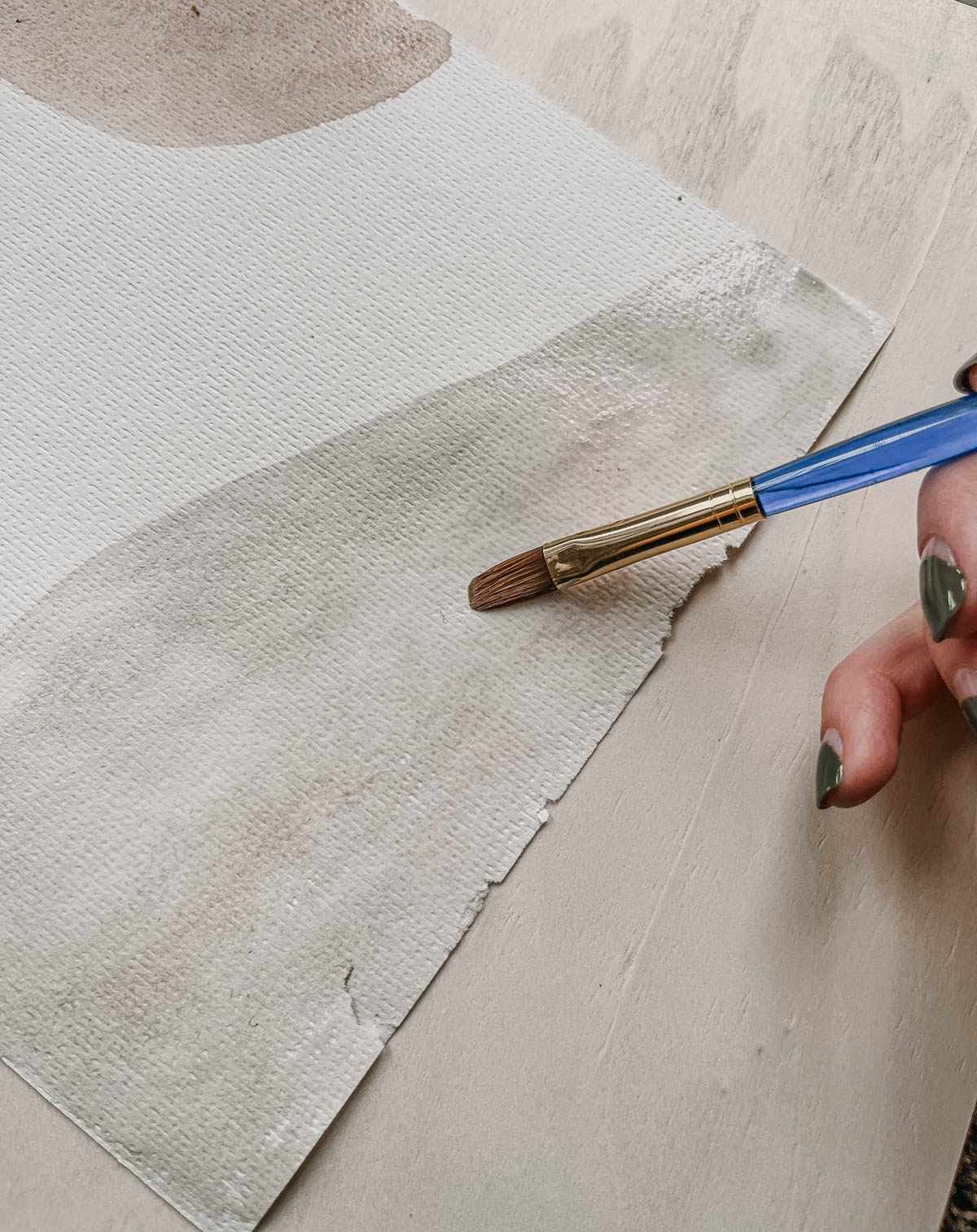 Neutral watercolour paint with abstract shapes for a DIY Line Art and Watercolor wall decor tutorial