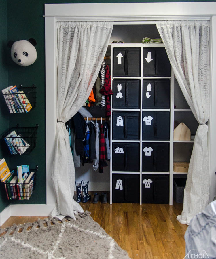 DIY Closet Organization- Ikea Storage Bin Labels... what a great storage solution! I love how it hides the closet clutter and kids can visually see where to put clothes away