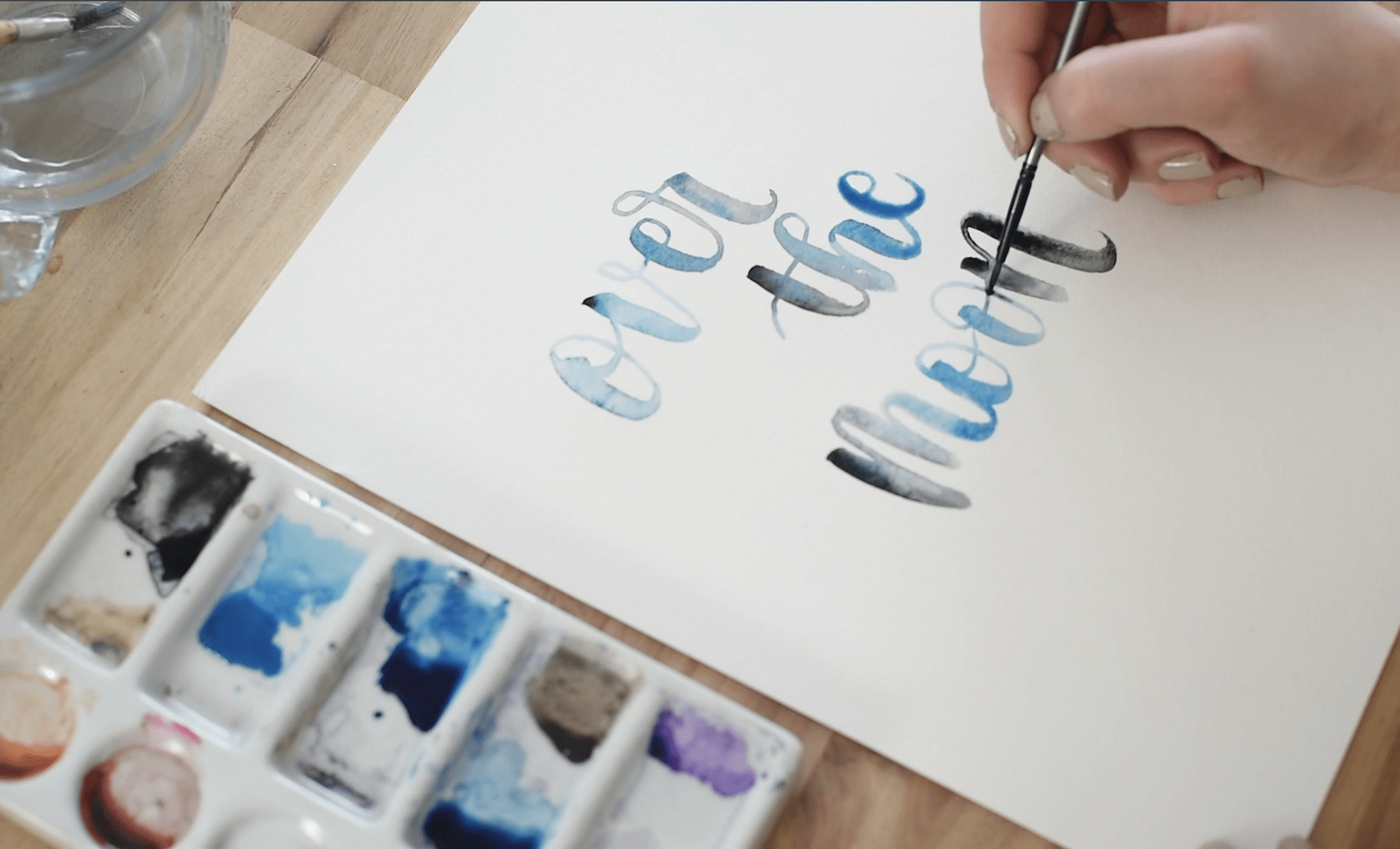 blending black and blue watercolour hand lettering (over the moon)